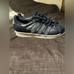 Navy adidas superstar shoes